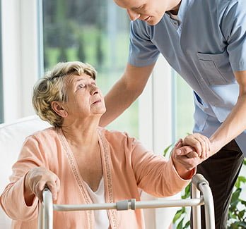 son visiting his mother in Minnesota dementia care home